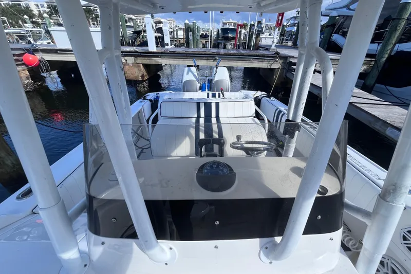  Yacht Photos Pics 2008 Intrepid 370 Cuddy boat at marina, view from helm station.