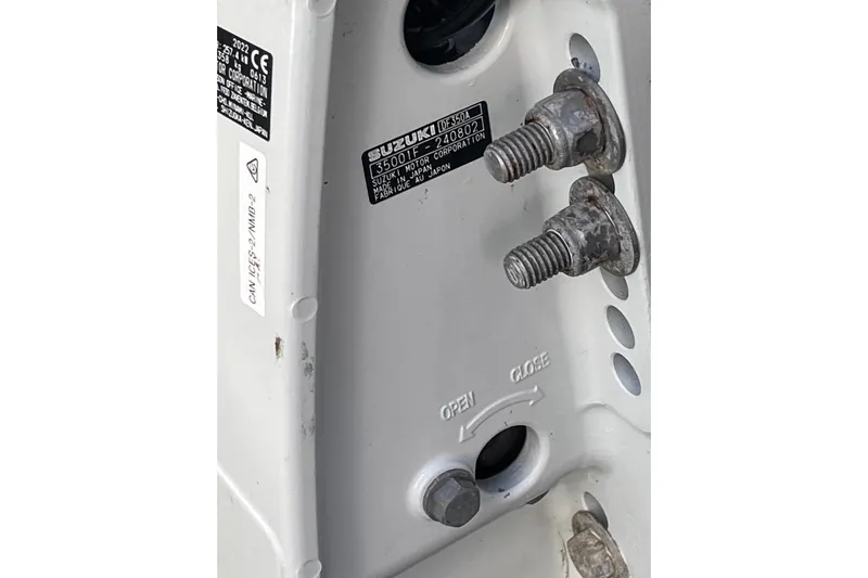  Yacht Photos Pics Close-up of a 2008 Intrepid 370 Cuddy boat engine components and labels.