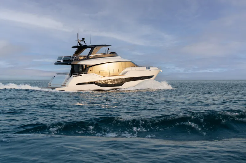  Yacht Photos Pics Luxury Cranchi Sessantasette 67 yacht cruising on open sea, 2024 model.