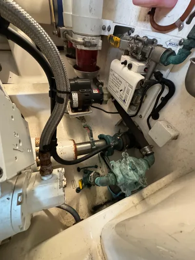 Land Ho Yacht Photos Pics Engine compartment of a 2007 Cabo 40 Express boat, showcasing mechanical components.