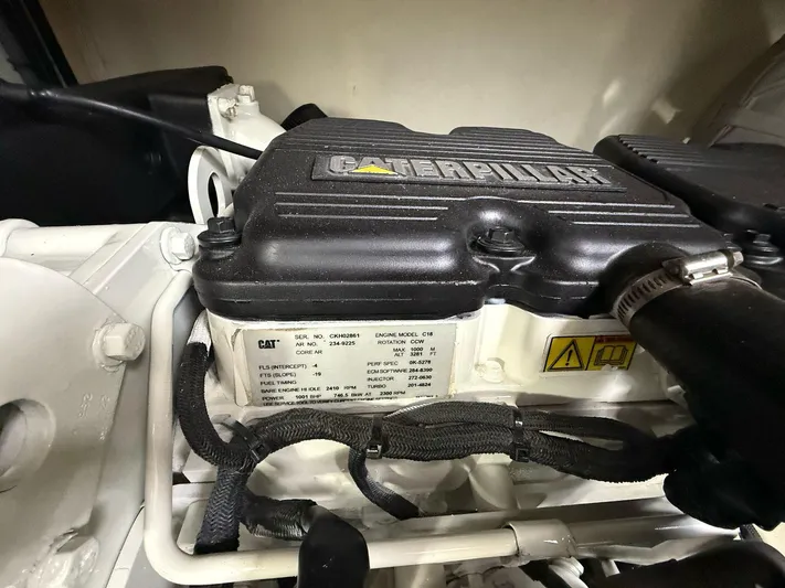  Yacht Photos Pics Caterpillar engine in 2009 Princess V58 yacht, detailed view of components and labels.