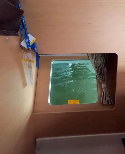 Bleu Lagoon Yacht Photos Pics Interior view of 2012 Lagoon 421 yacht window overlooking the sea.