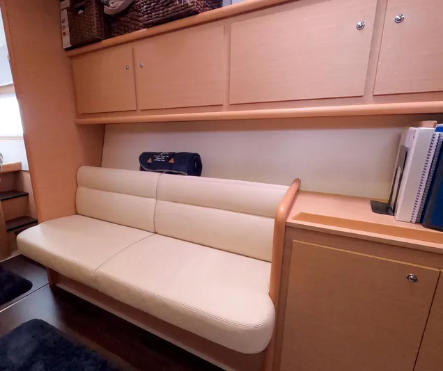 Bleu Lagoon Yacht Photos Pics Interior of 2012 Lagoon 421 yacht with beige seating and wooden cabinetry.