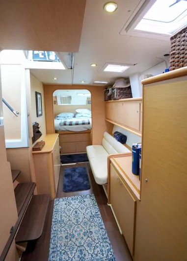Bleu Lagoon Yacht Photos Pics Interior of 2012 Lagoon 421 catamaran, featuring cozy cabin and modern furnishings.