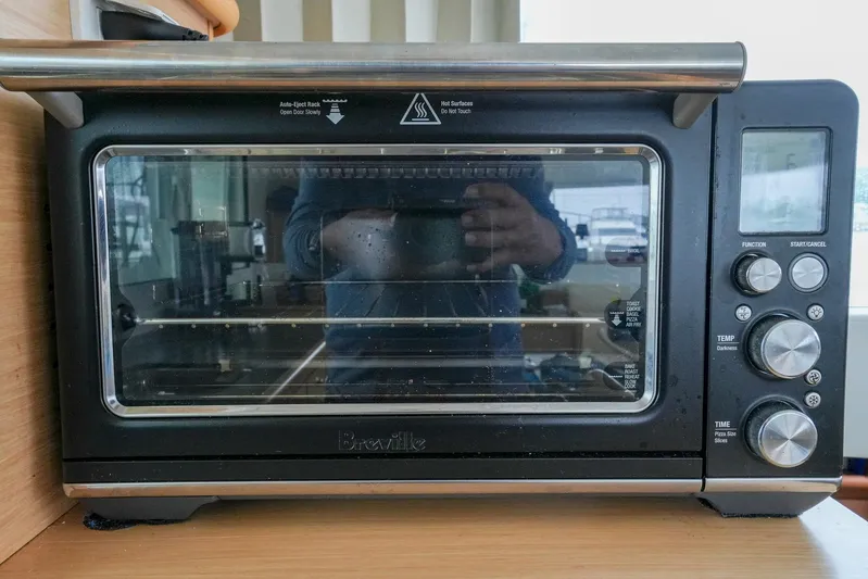 Bleu Lagoon Yacht Photos Pics Breville toaster oven on Lagoon 421 yacht, 2012 model, with reflection of person taking photo.