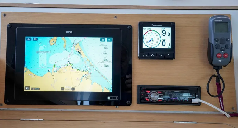 Bleu Lagoon Yacht Photos Pics Navigation equipment on a 2012 Lagoon 421 catamaran, featuring a map display and control panel.