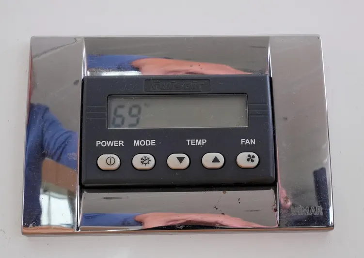 Bleu Lagoon Yacht Photos Pics Digital control panel on a 2012 Lagoon 421 yacht, displaying temperature settings.