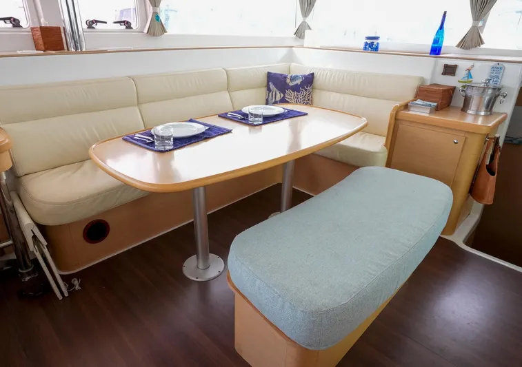 Bleu Lagoon Yacht Photos Pics Interior of 2012 Lagoon 421 yacht with cozy dining area and elegant decor.