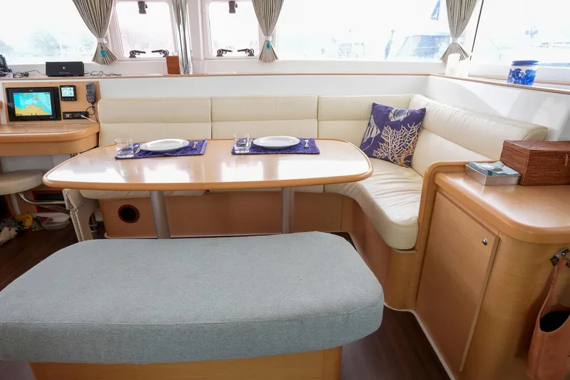 Bleu Lagoon Yacht Photos Pics Interior of 2012 Lagoon 421 yacht with dining area and cozy seating.