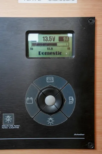 Bleu Lagoon Yacht Photos Pics Control panel of a 2012 Lagoon 421 yacht displaying voltage and current.