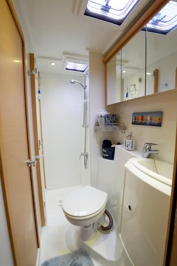 Bleu Lagoon Yacht Photos Pics 2012 Lagoon 421 yacht bathroom with shower, toilet, and modern fixtures.