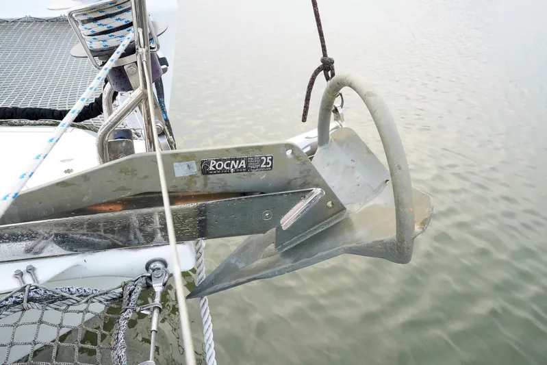 Bleu Lagoon Yacht Photos Pics Rocna anchor on 2012 Lagoon 421 catamaran, secured above calm water.