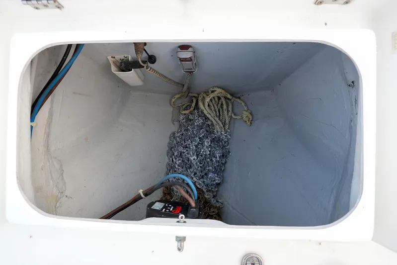 Bleu Lagoon Yacht Photos Pics Storage compartment of 2012 Lagoon 421 boat with ropes and equipment.