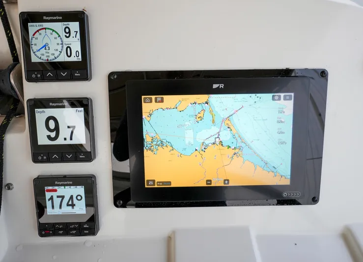 Bleu Lagoon Yacht Photos Pics Navigation instruments on a 2012 Lagoon 421 catamaran, featuring a digital map display.