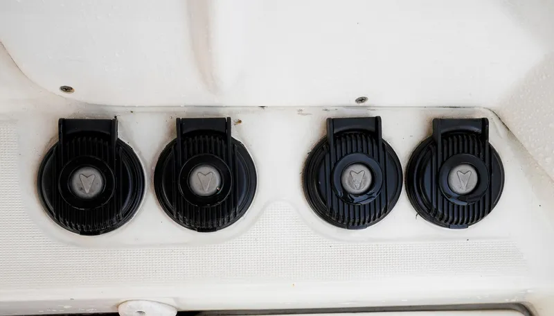 Bleu Lagoon Yacht Photos Pics Four black circular vents on a 2012 Lagoon 421 yacht interior.