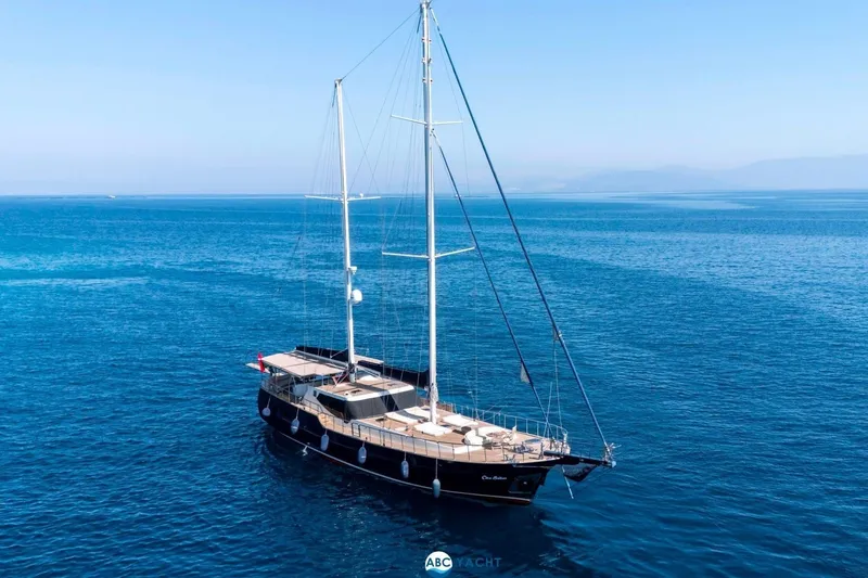 Cİca Sultan Yacht Photos Pics Luxurious 2014 Ark Yat 24M yacht sailing on calm blue waters.