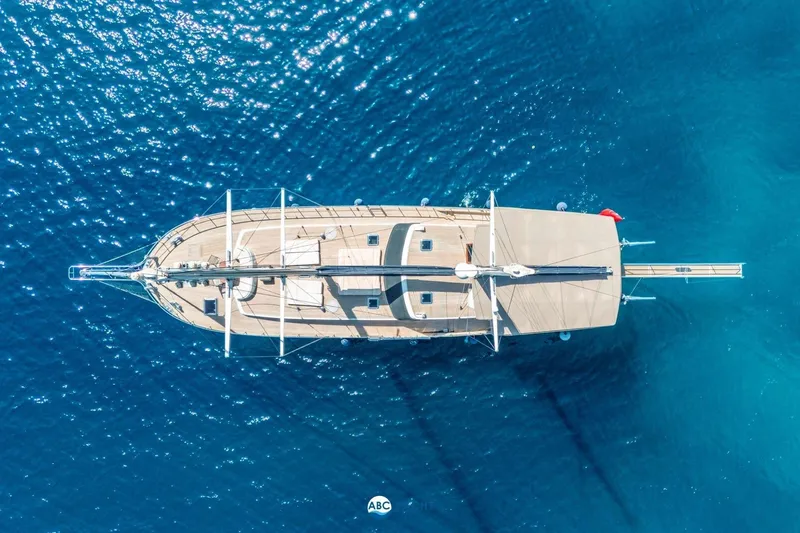 Cİca Sultan Yacht Photos Pics Aerial view of 2014 Ark Yat 24M yacht on clear blue water.