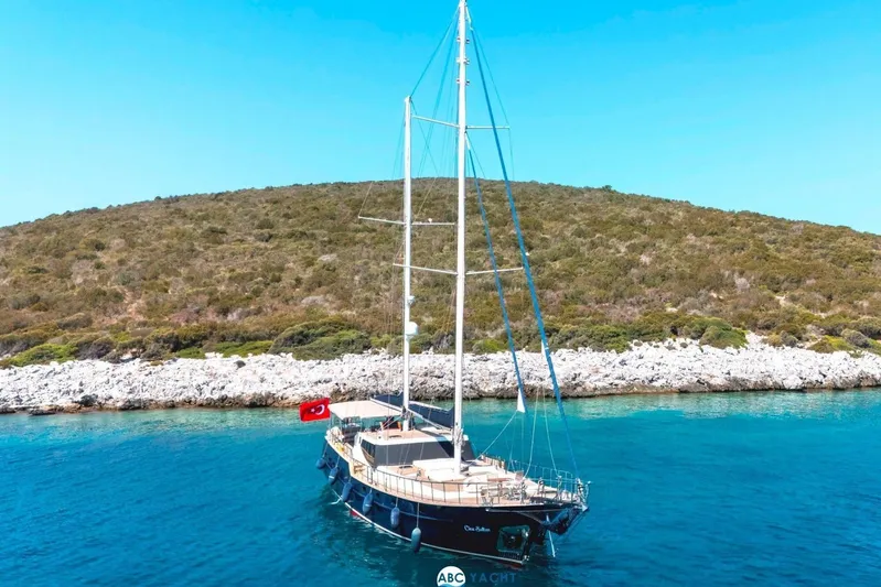 Cİca Sultan Yacht Photos Pics Luxurious Ark Yat 24M yacht sailing near rocky coastline, 2014 model.