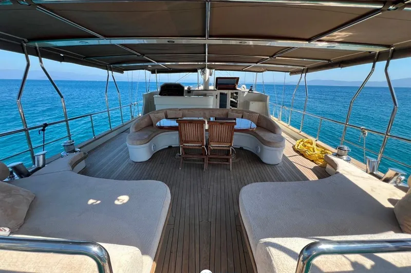 Cİca Sultan Yacht Photos Pics Luxurious 2014 Gulet ARK YAT 24M yacht deck with seating, overlooking blue ocean.