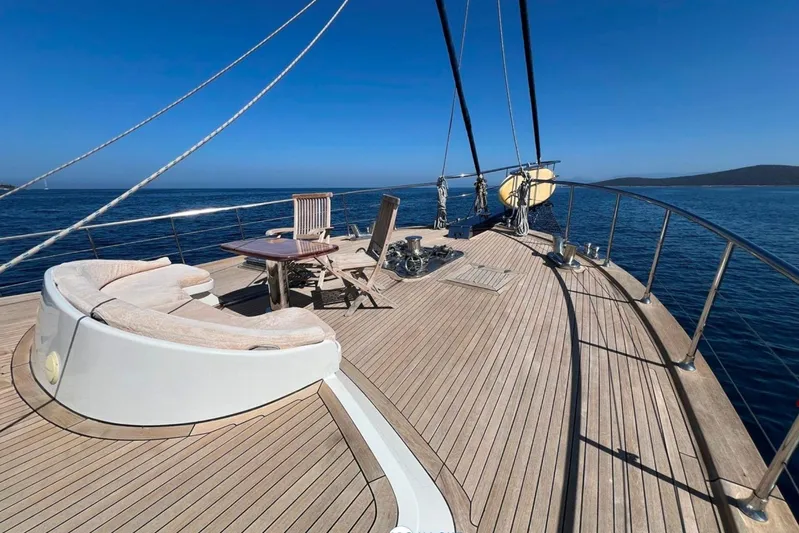 Cİca Sultan Yacht Photos Pics Luxurious Ark Yat 24M yacht deck, 2014 model, sailing on calm blue waters.