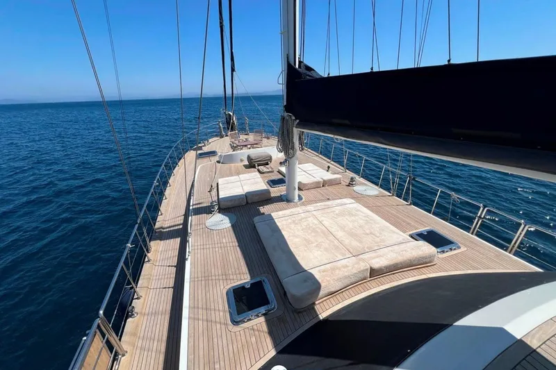 Cİca Sultan Yacht Photos Pics Luxurious Ark Yat 24M yacht deck, 2014 model, sailing on calm blue sea.