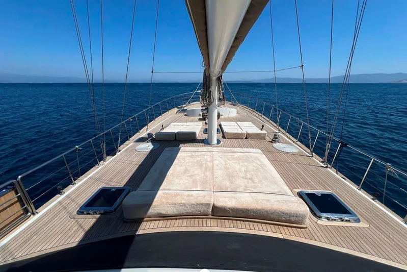 Cİca Sultan Yacht Photos Pics Luxurious Ark Yat 24M yacht deck with sunbeds, sailing on calm blue sea, 2014 model.
