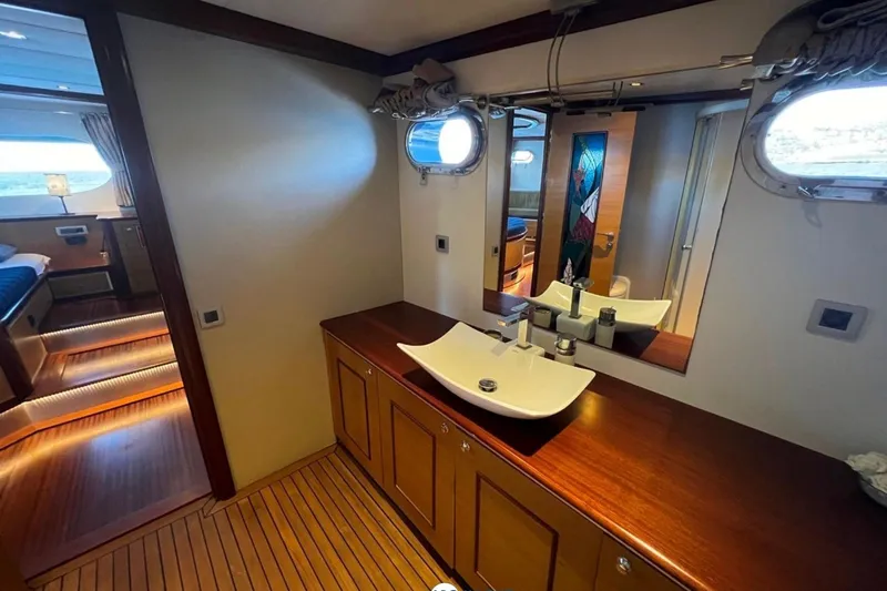 Cİca Sultan Yacht Photos Pics Luxurious interior of 2014 Ark Yat 24M yacht featuring elegant wood finishes and modern amenities.