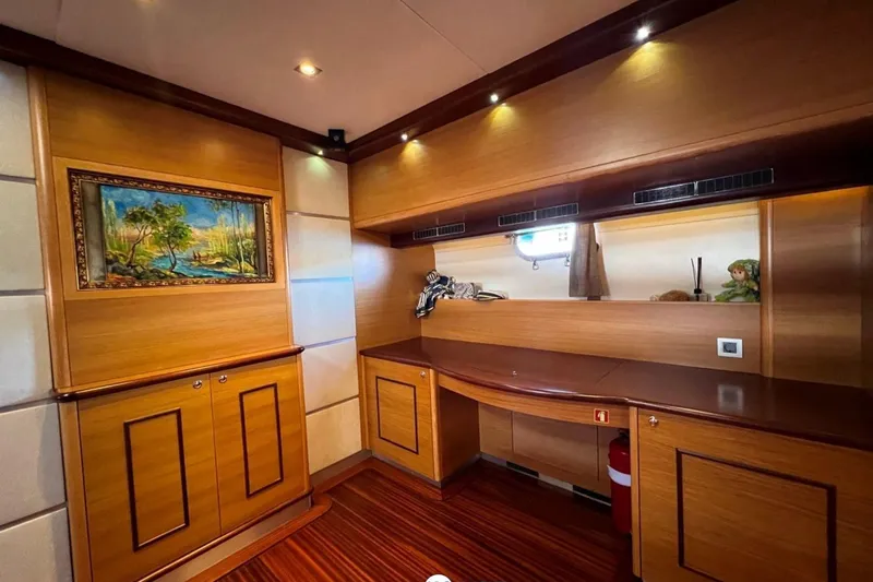 Cİca Sultan Yacht Photos Pics Luxurious interior of 2014 Ark Yat 24M yacht with wood paneling and artwork.