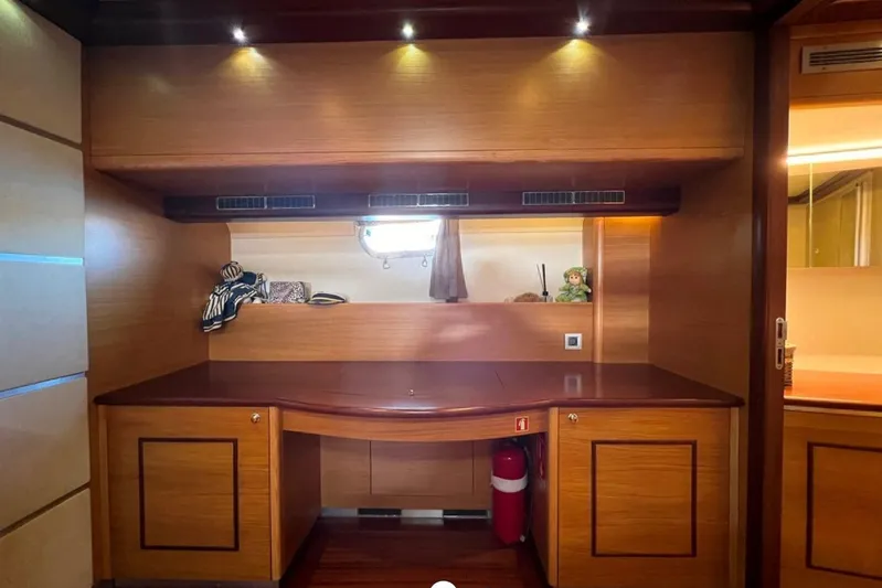 Cİca Sultan Yacht Photos Pics Luxurious wooden interior of 2014 Ark Yat 24M yacht with desk and storage.