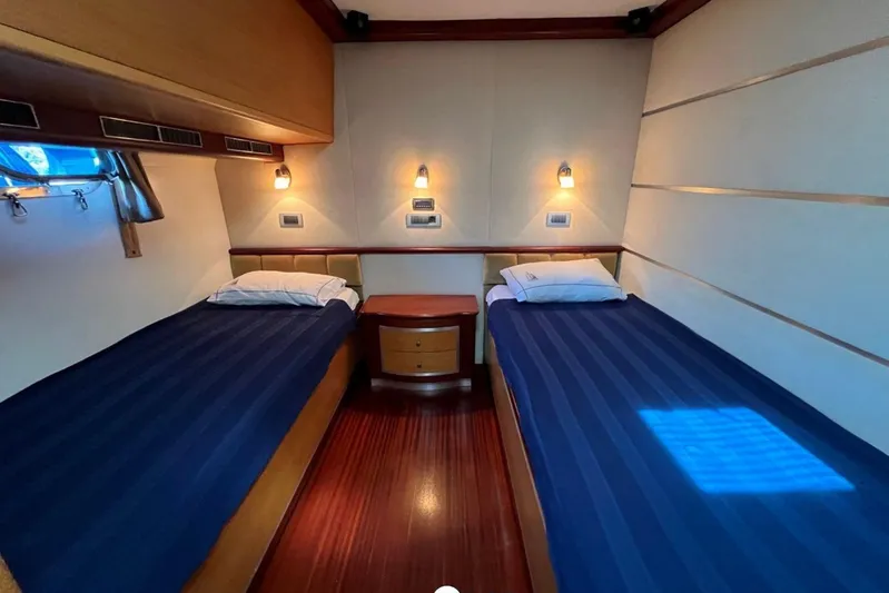 Cİca Sultan Yacht Photos Pics Luxurious twin cabin interior on 2014 Ark Yat 24M yacht, featuring elegant wood finishes.
