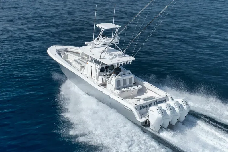 Good Times Yacht Photos Pics 2020 Invincible 42' Open Fisherman boat cruising on open water.