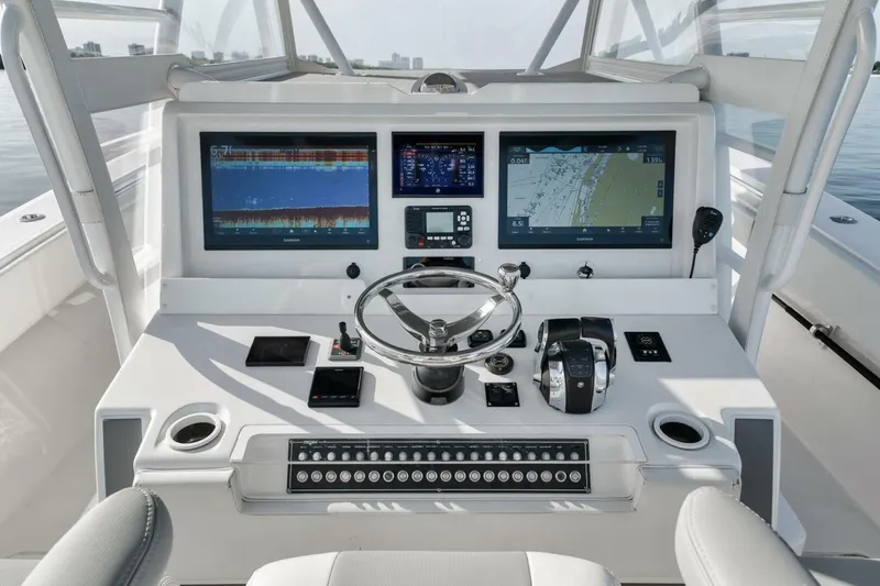 Good Times Yacht Photos Pics 2020 Invincible 42' Open Fisherman boat dashboard with advanced navigation and control systems.