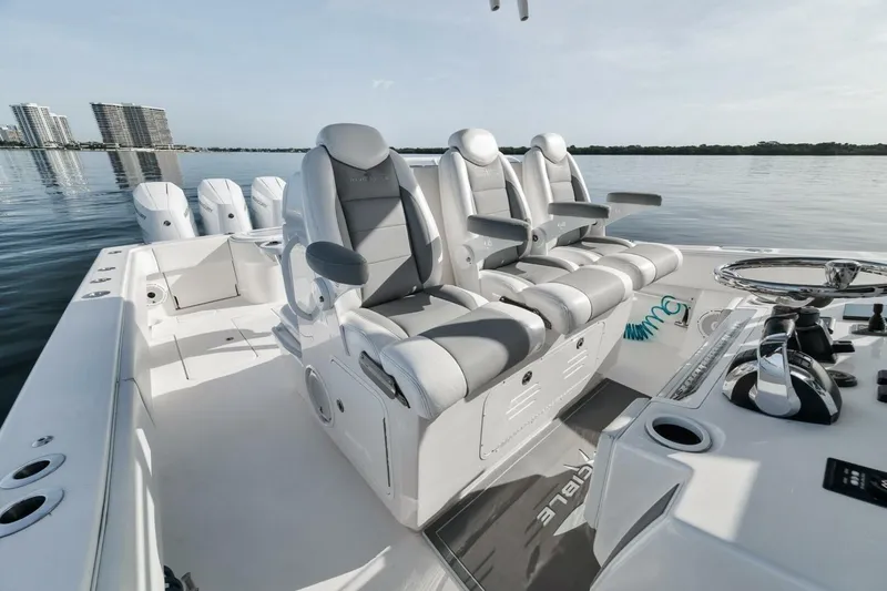 Good Times Yacht Photos Pics 2020 Invincible 42' Open Fisherman boat interior with luxurious seating and modern controls.