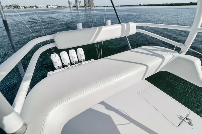 Good Times Yacht Photos Pics 2020 Invincible 42' Open Fisherman boat with triple engines, viewed from the upper deck.