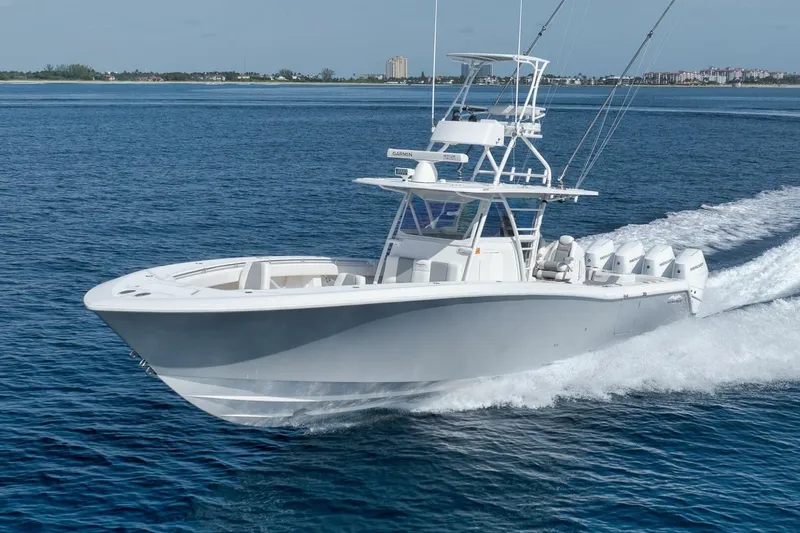 Good Times Yacht Photos Pics 2020 Invincible 42' Open Fisherman boat cruising on open water.