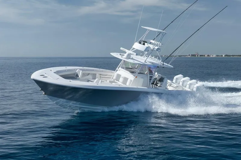 Good Times Yacht Photos Pics 2020 Invincible 42' Open Fisherman boat cruising on open water.