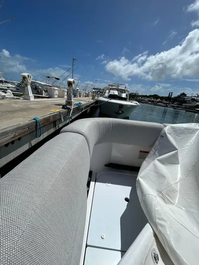  Yacht Photos Pics 2024 Azimut Verve 48 docked at marina under clear blue sky.