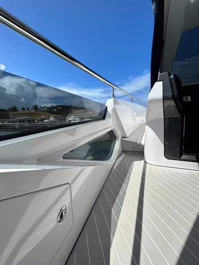  Yacht Photos Pics 2024 Azimut Verve 48 yacht deck with sleek design and clear blue sky.