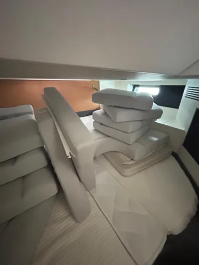  Yacht Photos Pics Interior cabin of 2024 Azimut Verve 48 yacht with stacked cushions.