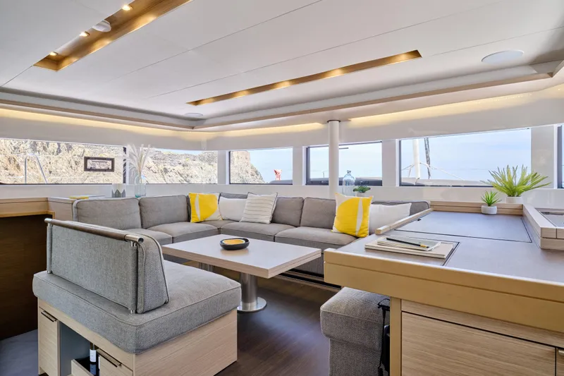  Yacht Photos Pics Luxurious interior of 2026 Lagoon 51 Owners version yacht with modern seating and decor.