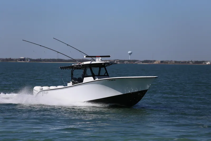  Yacht Photos Pics 2018 Yellowfin 39 boat cruising on open water under clear skies.