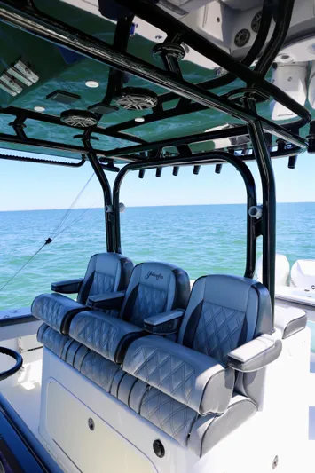  Yacht Photos Pics 2018 Yellowfin 39 boat interior with luxury seating and ocean backdrop.