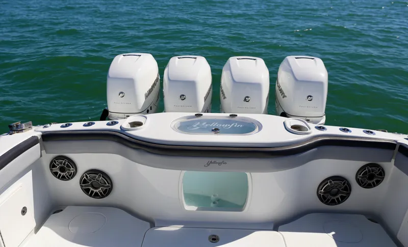  Yacht Photos Pics 2018 Yellowfin 39 boat with four powerful outboard engines on open water.