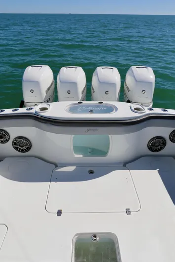  Yacht Photos Pics 2018 Yellowfin 39 boat with four outboard engines on open water.