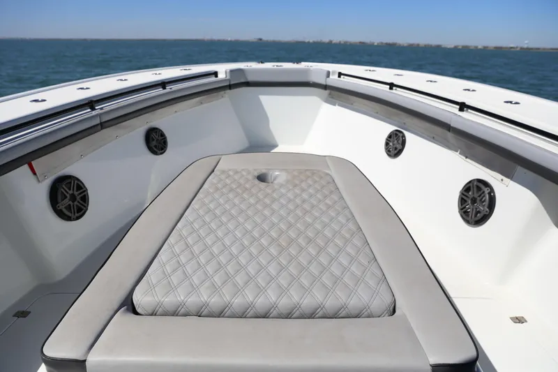  Yacht Photos Pics 2018 Yellowfin 39 boat interior with cushioned seating and ocean view.