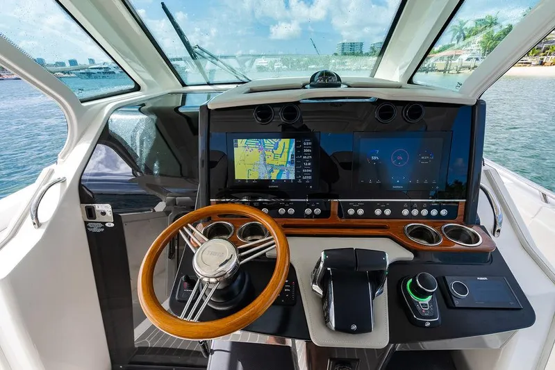 Let's Go Yacht Photos Pics 2023 Tiara Yachts 34 LS helm with advanced navigation displays and controls.