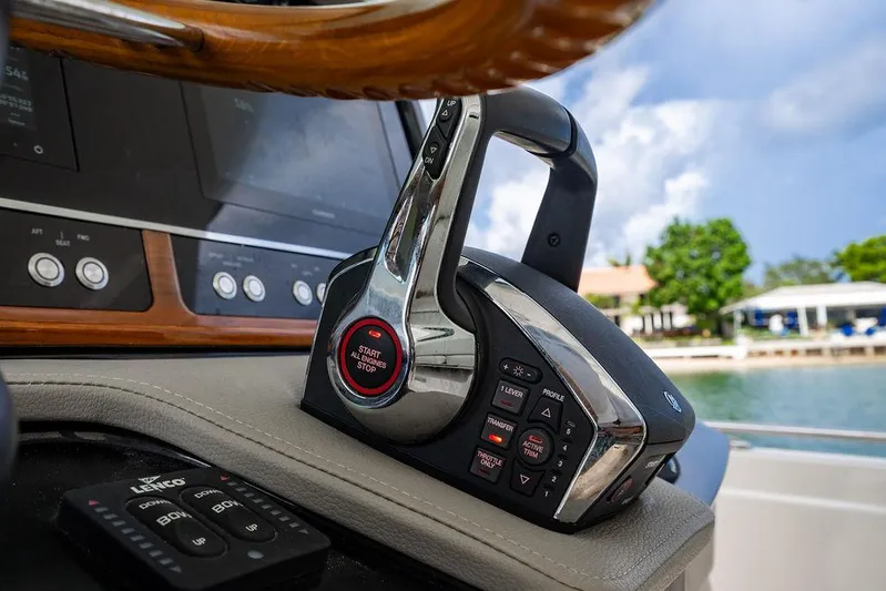 Let's Go Yacht Photos Pics 2023 Tiara Yachts 34 LS helm controls with start-stop button, dockside view.