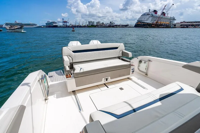 Let's Go Yacht Photos Pics 2023 Tiara Yachts 34 LS boat interior with ocean and cruise ships in background.