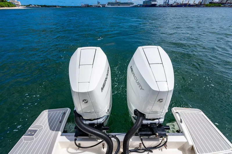 Let's Go Yacht Photos Pics 2023 Tiara Yachts 34 LS with dual Mercury outboard engines on open water.