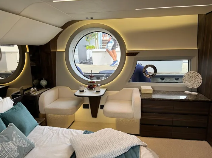 4 Stateroom Layout Yacht Photos Pics Luxurious interior of 2024 Aicon 66 Vivere yacht with elegant seating and decor.
